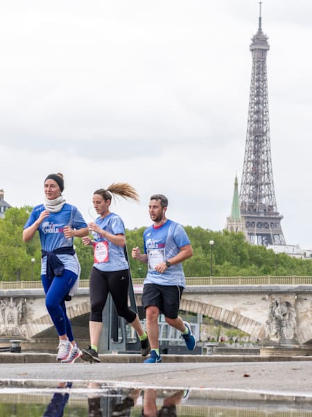 Des participants courent sur le parcours de la sixième édition de la course Wings for Life World Run, à Paris, en France, le 5 mai 2019.