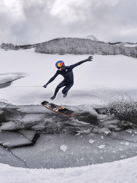 Brian Grubb shoves it over the snow