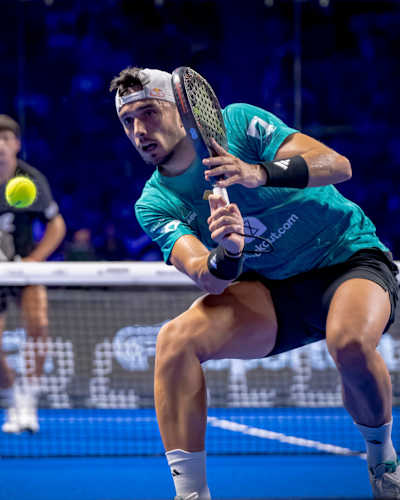Alejandro Galán showcases dynamic padel skills during the thrilling Premier Padel 2025 Finals in Barcelona, Spain, battling Fede Chingotto for championship glory