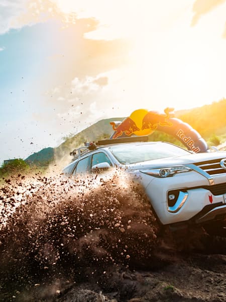 A rally driver manouvres their car through the terrain at Royal Rajasthan Rally.
