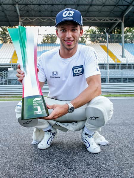 Race winner Pierre Gasly celebrates on the podium with the trophy