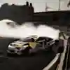 Conor Shanahan drifts his Red Bull car with precision on Spike Island, Cork, in 2025, surrounded by tyre smoke and high-octane excitement