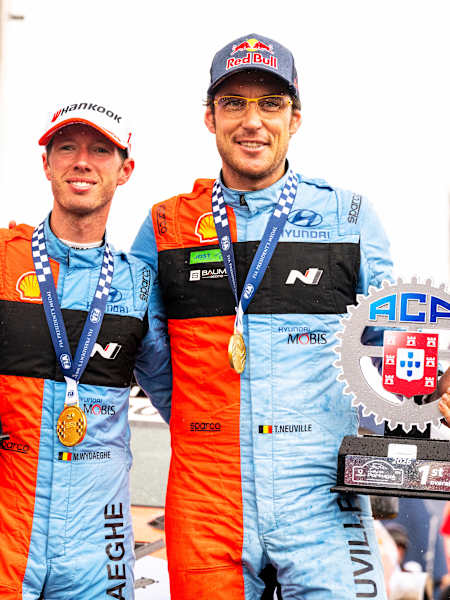 Thierry Neuville and Martijn Wydaeghe of Hyundai Shell Mobis WRT celebrate their 2026 World Rally Championship victory in Porto, Portugal. 