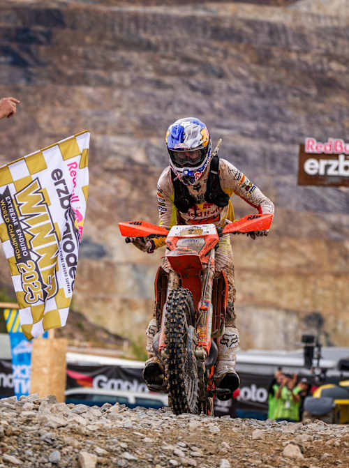 Manuel Lettenbichler crosses the finish line in first place at Red Bull Erzbergrodeo 2025 in Eisenerz, Austria. 
