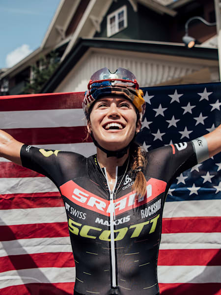 Kate Courtney celebrates at the UCI XCO World Cup in Snowshoe in 2019 