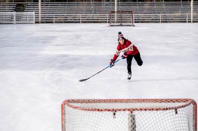 Hilary Knight takes practice shots in Sun Valley, Idaho