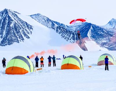 Skydivers get ready to sky dive at a camp in the Antarctic.