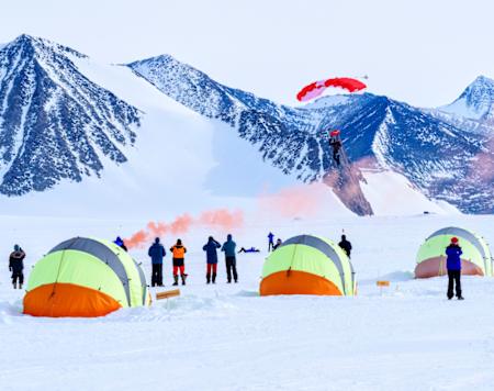 Skydivers get ready to sky dive at a camp in the Antarctic.