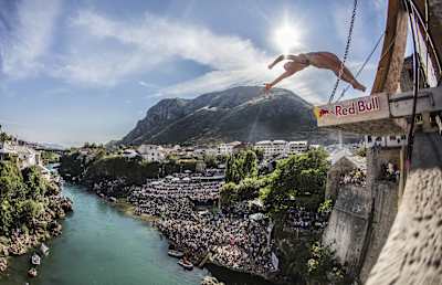 Image Description: Lysanne Richard of Canada dives from the 21.5 metre platform on Stari Most during the Red Bull Cliff Diving World Series in Mostar, Bosnia & Herzegovina on September 24, 2016