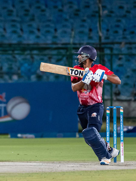 A batmsan plays a shot during a match of the Red Bull Campus Cricket India finals.