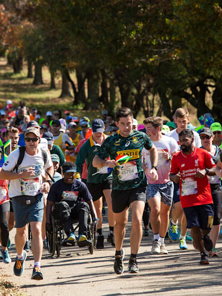 Participants perform during the sixth edition of the Wings for Life World Run in Pretoria, South Africa on May 5, 2019.