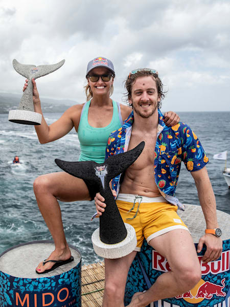 Rhiannan Iffland of Australia and Gary Hunt of the UK celebrate at the fourth stop of the Red Bull Cliff Diving World Series in São Miguel, Azores, Portugal on June 22, 2019.