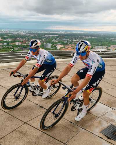 Red Bull – BORA – hansgrohe 2026 Tour de France Teamkit launch at Olympiaturm Munich, Germany. With Remco Evenepoel and Florian Lipowitz.