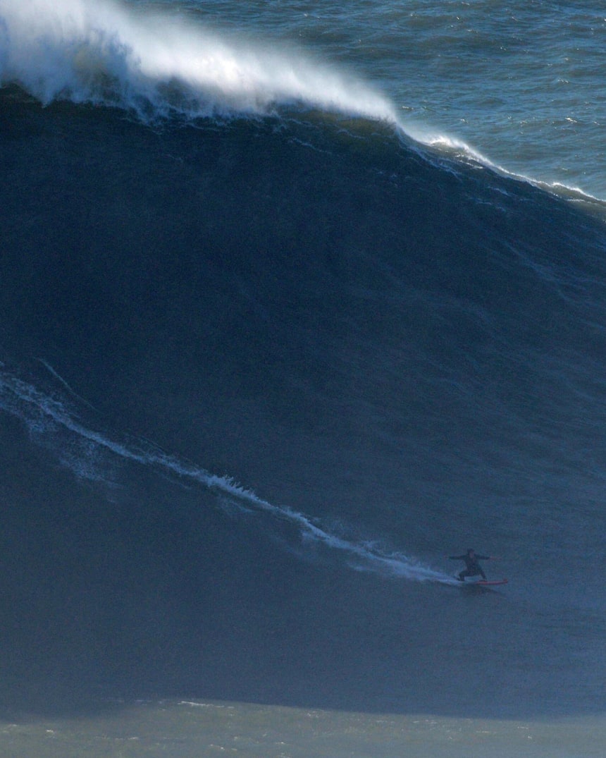 Justine Dupont Surfs Biggest Wave In Nazare Portugal