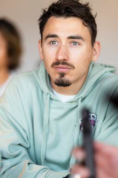 Charles Poujade of France hears a briefing at the Red Bull Ibiza Royale content creator workshop in Salzburg, Austria in 2024.