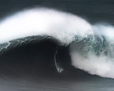 Kai Lenny surfs big waves in Nazaré, Portugal on February 11, 2020.