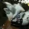 Grégoire Munster of M-Sport Ford World Rally Team surges through water at the World Rally Championship Paraguay in Encarnacion, Paraguay, on August 30, 2025, with bold Red Bull branding
