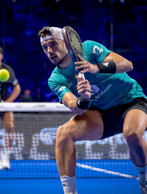 Alejandro Galán showcases dynamic padel skills during the thrilling Premier Padel 2025 Finals in Barcelona, Spain, battling Fede Chingotto for championship glory