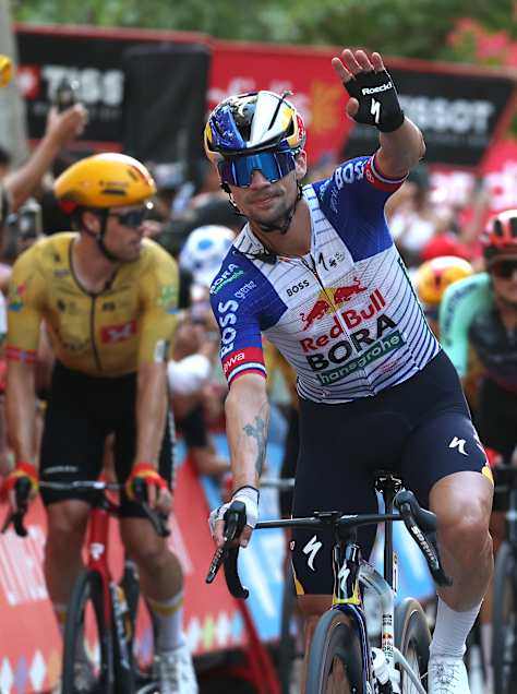 Primož Roglič celebrates at finish line during the La Vuelta - 81st Tour of Spain 2026, Stage 21 a 112km stage from Granada to Granada on September 13, 2026 in Granada, Spain.