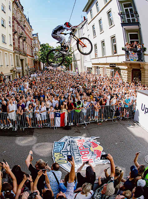 Nina Hoffmann launches her mountain bike above the crowd during Red Bull Cerro Abajo in Stuttgart, Germany, on 5 September 2026