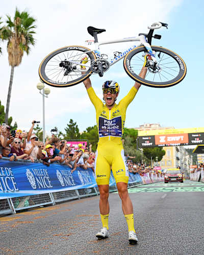 Demi Vollering of Team FDJ UNITED-SUEZ celebrates at the finish line after winning the Tour de France de Femmes for the second time. 