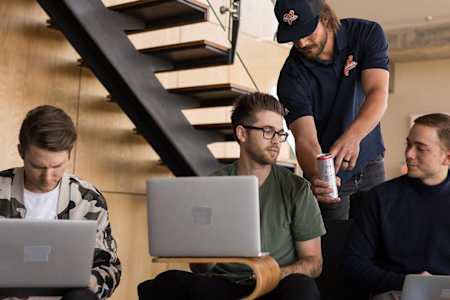 Kris Bryant hands fantasy baseball enthusiast a Red Bull can.