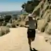 Arda Saaçti running up a hill for the ultrarunning challenge Red Bull Cyborg Season 2026
