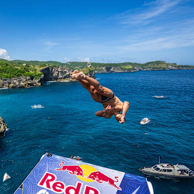 Aidan Heslop of the UK performs a breathtaking dive from the 27 metre platform at Broken Beach in Bali, Indonesia for the first stop of the Red Bull Cliff Diving World Series in 2026