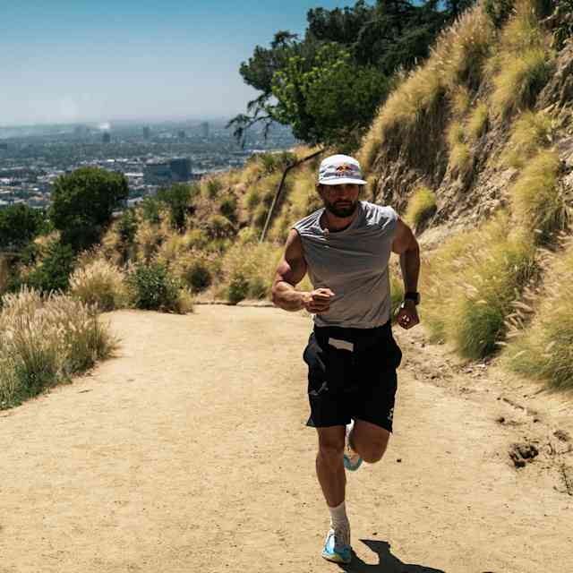 Arda Saaçti running up a hill for the ultrarunning challenge Red Bull Cyborg Season 2026