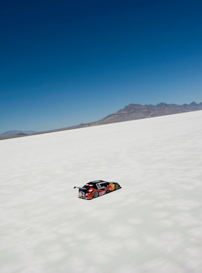 A photo of Brazil's Cacá Bueno racing his stock car across the Bonneville Salt Flats in Utah, USA.