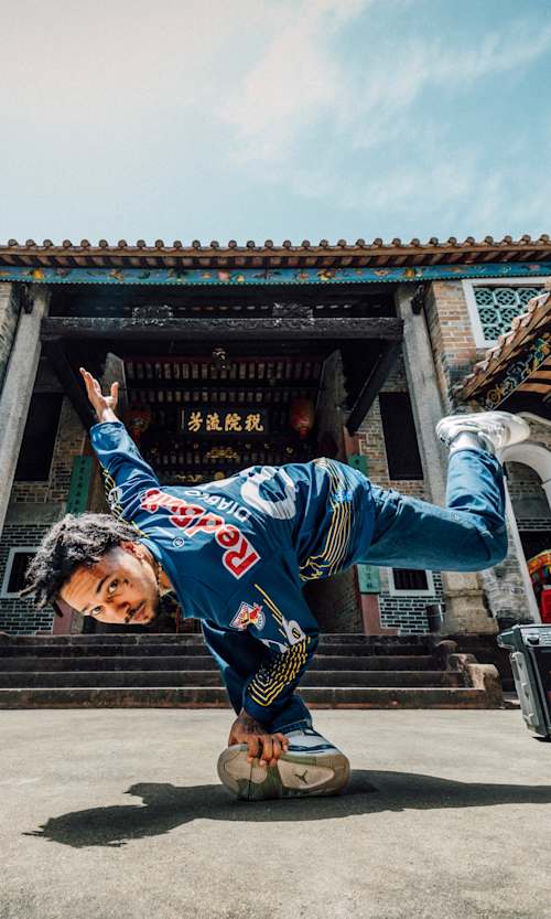 Jean-Michel Cruel showcases an electrifying breakdance pose at Red Bull Dance Your Style 2025 in Hong Kong, energising the iconic venue with dynamic Red Bull spirit on April 14, 2025