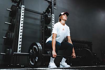 Volleyball player Madisen Skinner performs a deadlift. 