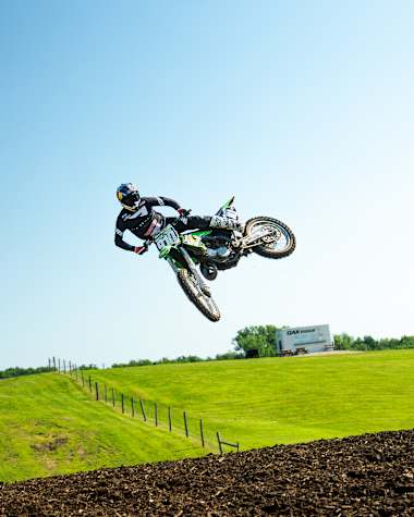Carson Brown hits a jump in Oak Ridge MX, Garwin, Iowa in July 2026