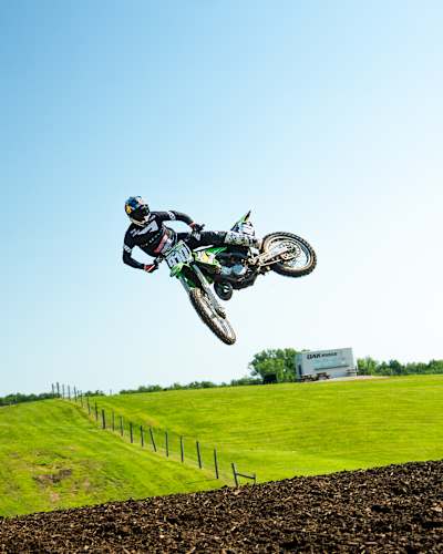 Carson Brown hits a jump in Oak Ridge MX, Garwin, Iowa in July 2026