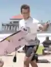 Julian Wilson surfs the waves in Fiji.