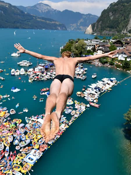 Diver Andy Jones in Sisikon, one of the best places to dive from a cliff in Europe. 