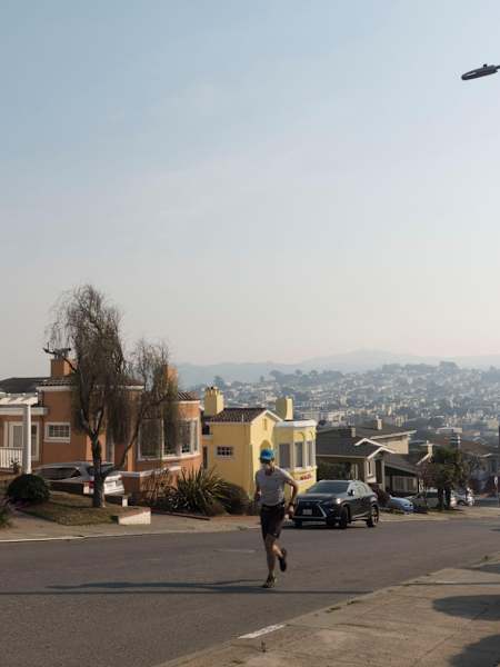Rickey Gates runs up hill in San Francisco during his 46 day marathon to run every single street in the Californian city.