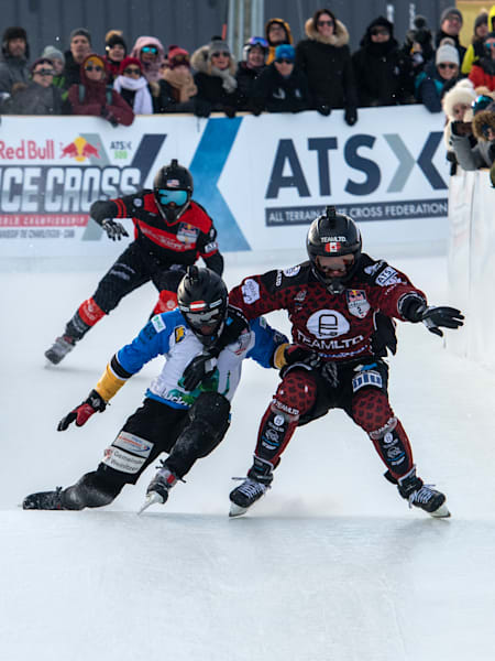 Marco Dallago, John Fisher, Cameron Naasz and Kyle Croxall approach the finish line in the men's final in Le Massif de Charlevoix, Canada on February 22, 2020.