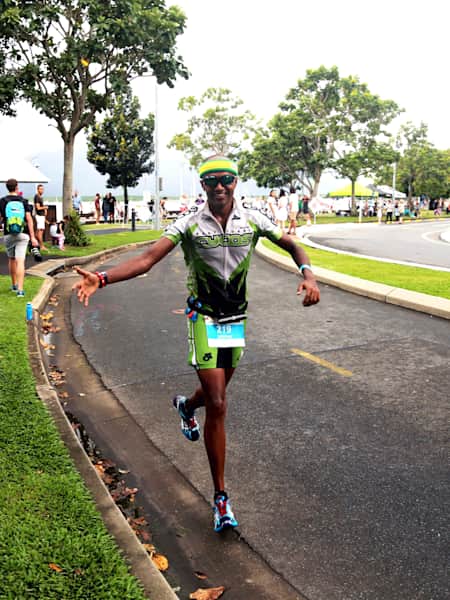 Deepak Raj runs during an Ironman race