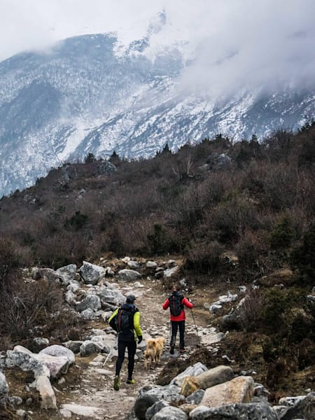 Ryan and Ryno running in the Manaslu Valley, Nepal after coming over Larke La Pass (5,135m) on March 12, 2018.