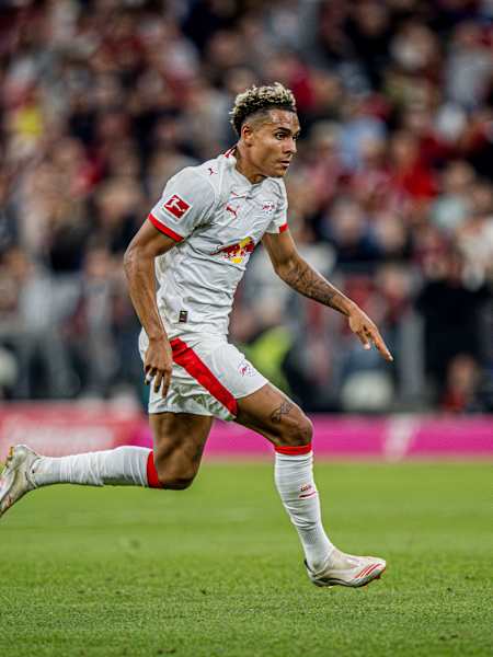 Antonio Nusa of RB Leipzig chases after the ball.