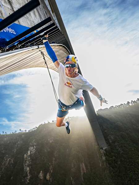 Thomas van Tonder swings from the Bloukrans Bridge in South Africa during Red Bull Bridge Bars in October 2026,