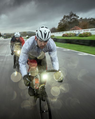 Participants ride their bikes on the Goodwood Motor Circuit in the UK.