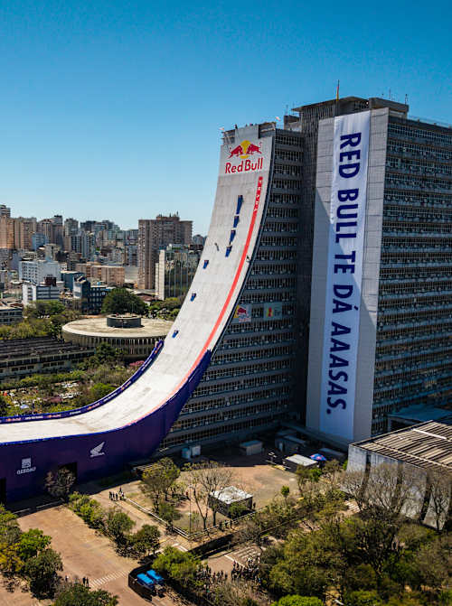 Pro skater Sandro Dias speeds down the epic Red Bull Building Drop mega ramp in Porto Alegre, Brazil, on September 25, 2025, shining at this iconic city event