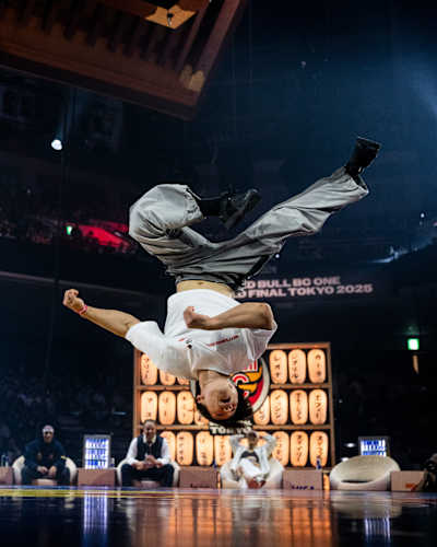 Judge B-boy Kill in mid air during the judges' showcase at the Bull BC One World Final at Ryogoku Kokugikan Sumo Arena, Tokyo, Japan in November 2025. 
