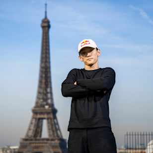 Phil Wizard poses for a portrait on a rooftop in Paris, France