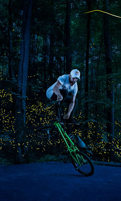 Terry Adams rides amongst the fireflies in East Tennessee, USA on June 12, 2022. 