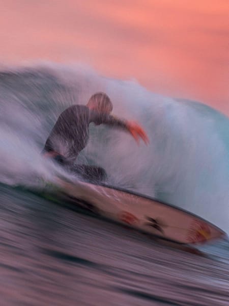 Surfer Kolohe Andino does a big turn at home in California.