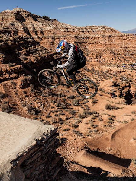 Carson Storch jumps from a ledge at Red Bull Rampage 2025 in Virgin, Utah, USA.