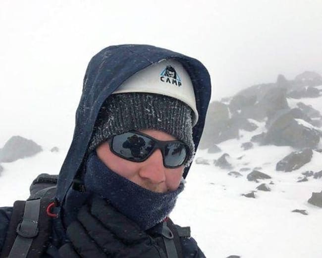 Blind climber Jack Garner summits Europe’s tallest peak